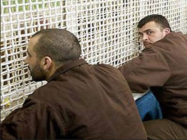 Dozens of Palestinians held by Israel join hunger strike