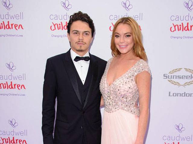 Lohan’s father labels actress’ fiance garbage