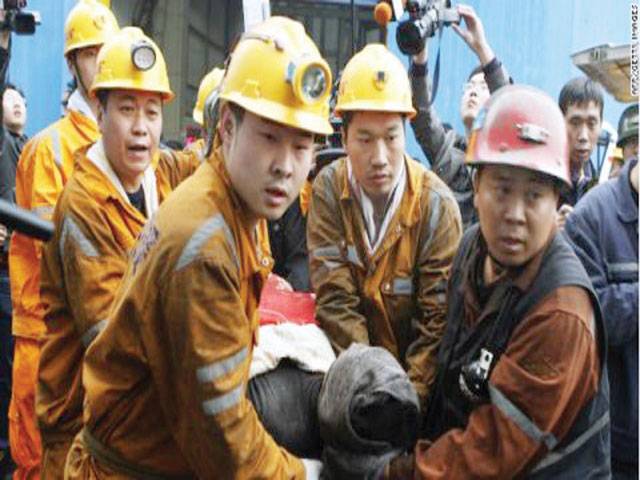 China blast kills 15 miners, 18 missing