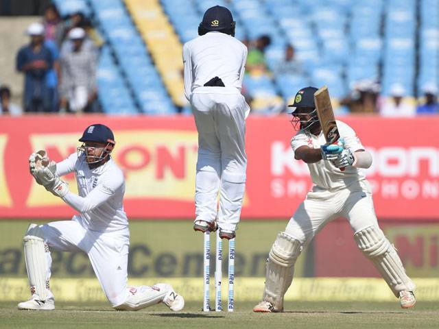 Pujara, Vijay lead India's strong batting reply
