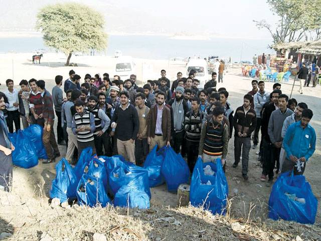 Clean green drive: Students collect garbage at Khanpur Dam