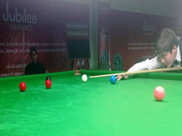 12-year old Hamza in snooker quarters