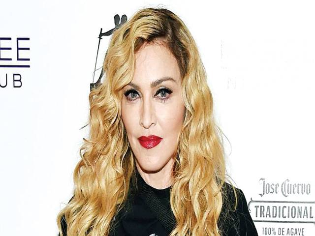 Madonna applies to adopt two children
