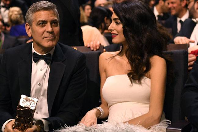 Clooney blasts Trump as Huppert's Elle wins at 'French Oscars' 