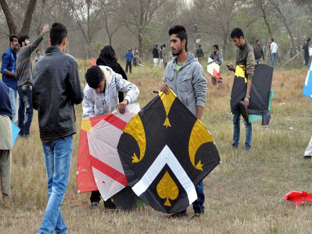 People celebrate basant in the twin cities