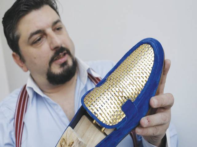 Gilt-y pleasure: Italian artisan crafts 24-carat gold shoes