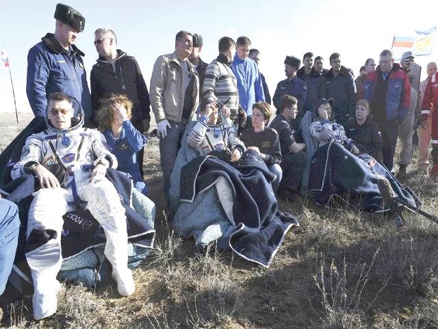 US, Russian crew lands after 6-month stay on ISS