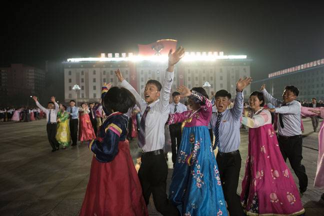 Participants perform in a mass dance
