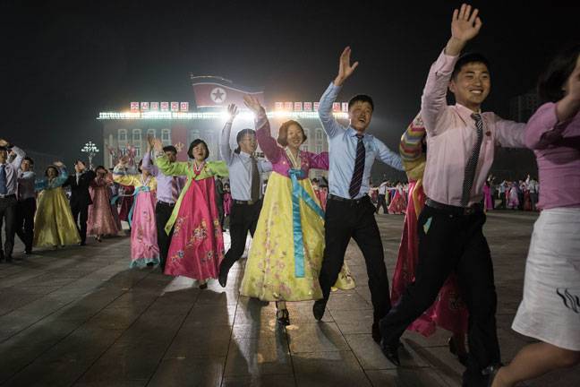 Participants perform in a mass dance