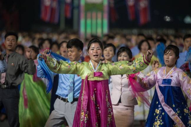 Participants perform in a mass dance
