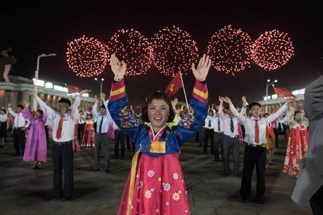 Participants perform in a mass dance