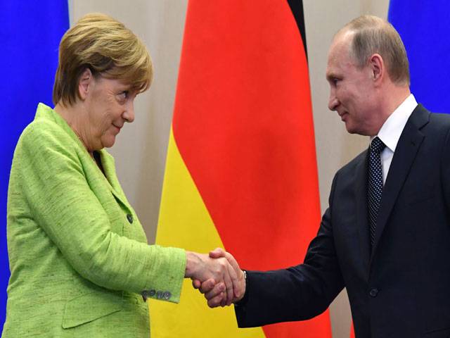 Putin, Merkel struggle to move past differences in tense meeting