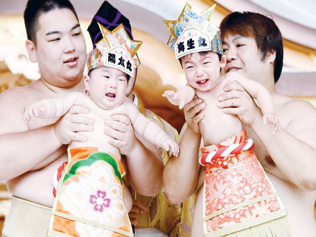 Bawling babies face off in Japan’s ‘crying sumo’
