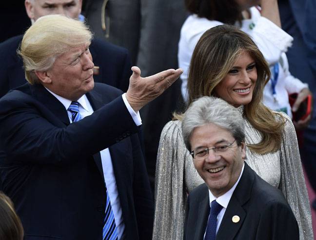 Trump and Italian PM arrive for a conceret G7 summit in Sicily