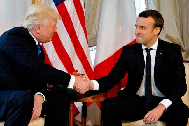 Macron says was ready to out-Trump Trump in handshake