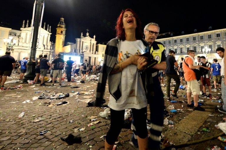 Italy bomb scare sparks stampede, injures 1,500