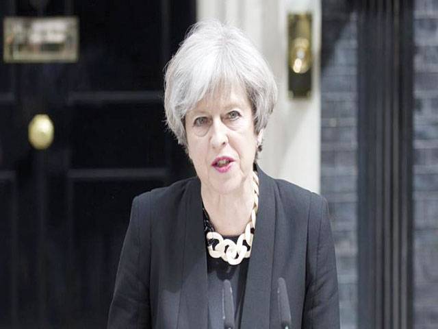 PM May apologises for London fire failures