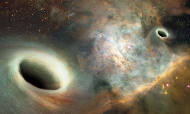 Orbiting supermassive black holes discovered