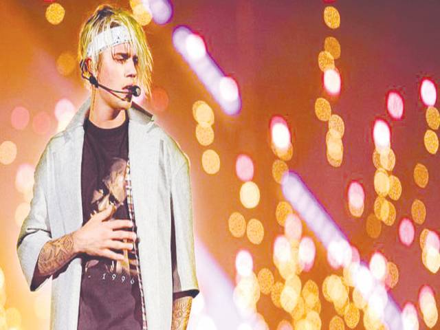 Bieber apologises after cancelling tour