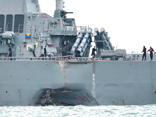 US navy pauses operations after 10 sailors lost in collision