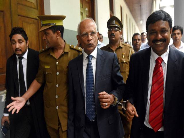 Sri Lanka jails Rajapakse's top aide over corruption