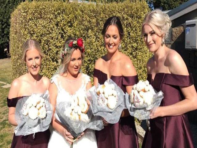 Bride gets married with bouquet made of doughnuts