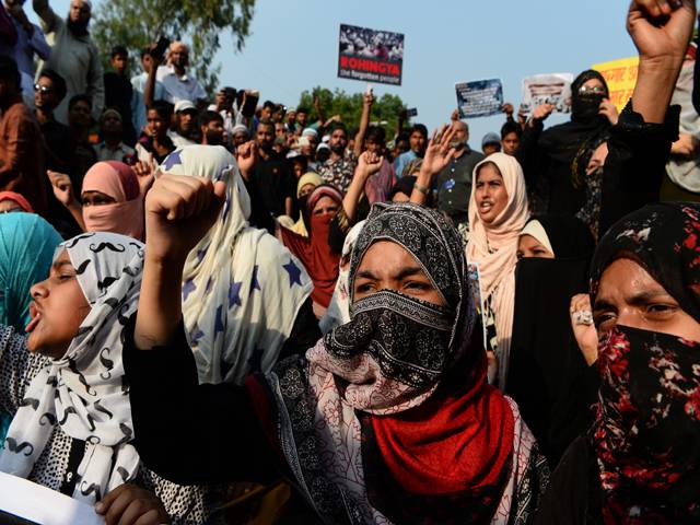 Indian demonstrators shout slogans