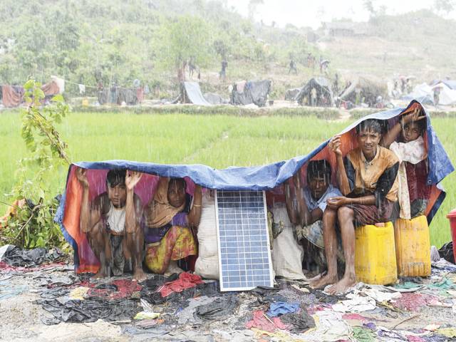 Rain and evictions add to Rohingya misery