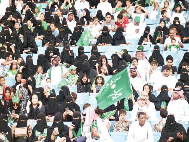 In a first, women throng Saudi stadium for national day