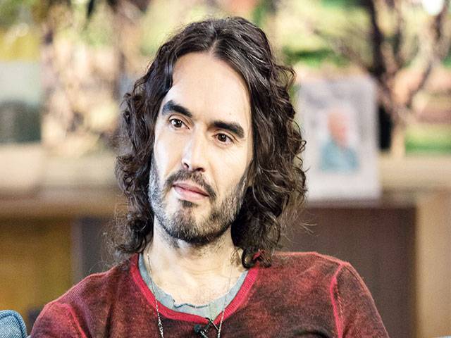 Russell Brand ‘living hand to mouth’