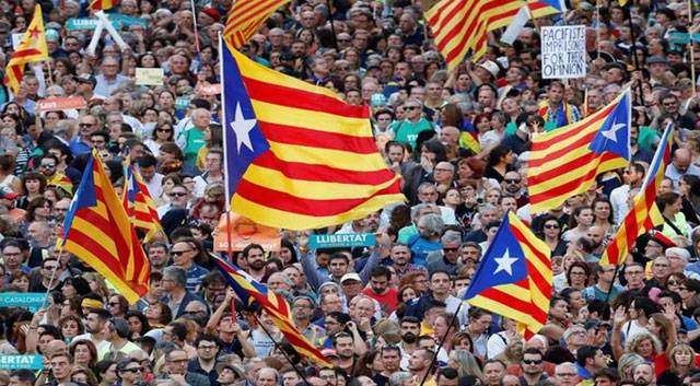 Catalan separatists vow civil disobedience as Spain standoff mounts