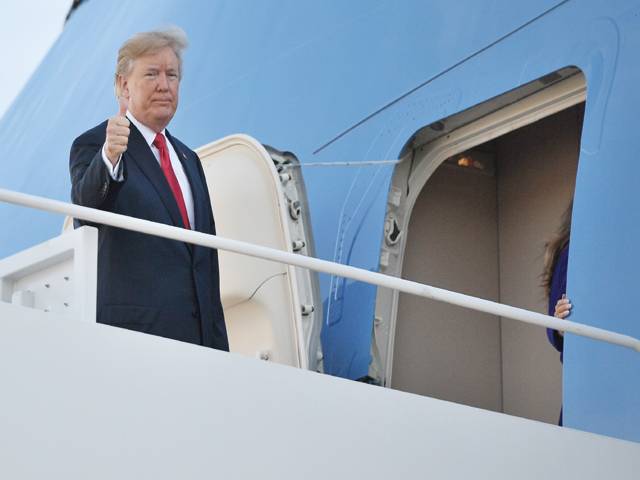 Trump departs for Asia, leaving trail of controversy