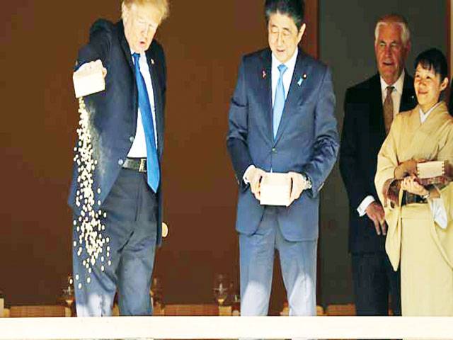 Trump dump delights peckish Japanese fish, outrages Twitter