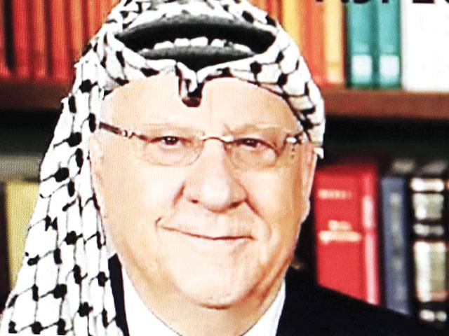 Probe as photo of Israel president in scarf