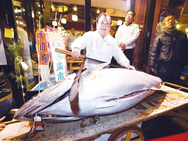 Japan’s historic Tsukiji market holds final New Year auction