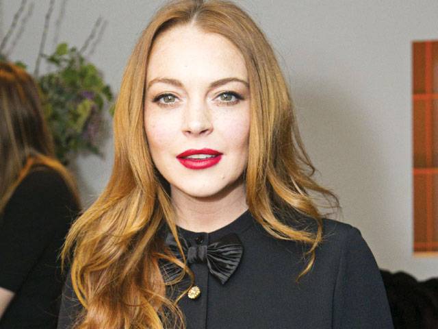 Lohan rivals Trump with own island