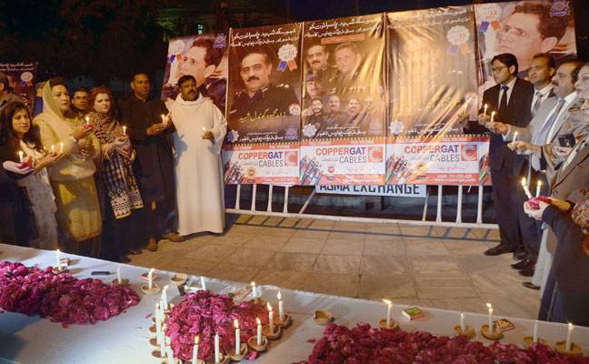 Candles vigil for martyrs of Chairing Cross incident
