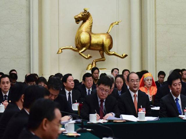 Naps and noodle talk at Chinese parliament term limit ‘debate’