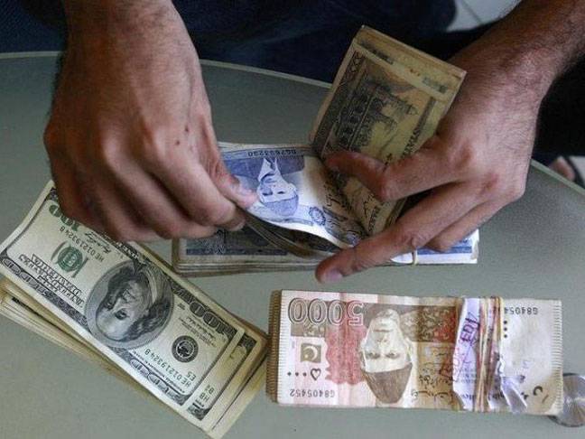 Rupee crashes to record low against dollar