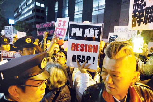 Japan protestors demand PM Abe resign over scandal