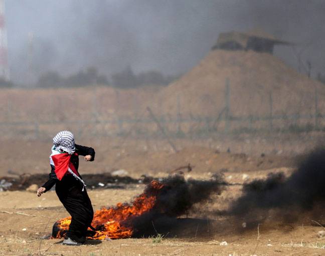 Palestinian demonstrator clashes with Israeli forces