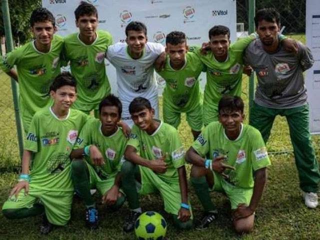 Pak street child football team returns home