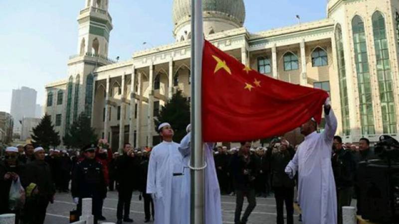 China calls on all mosques to raise national flag