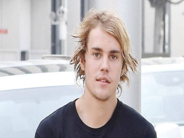 Bieber loves his long hair