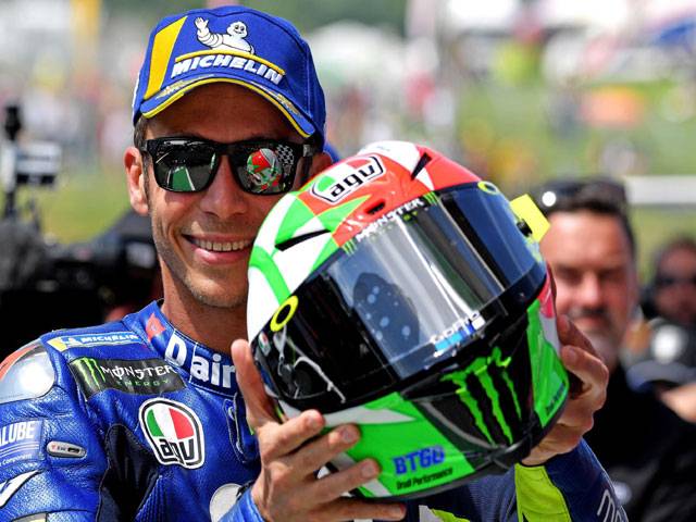 Italy's Rossi back on pole at Italian MotoGP