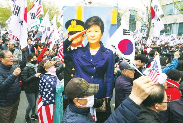 S Korea jails ex-spy chiefs for funnelling money to Park