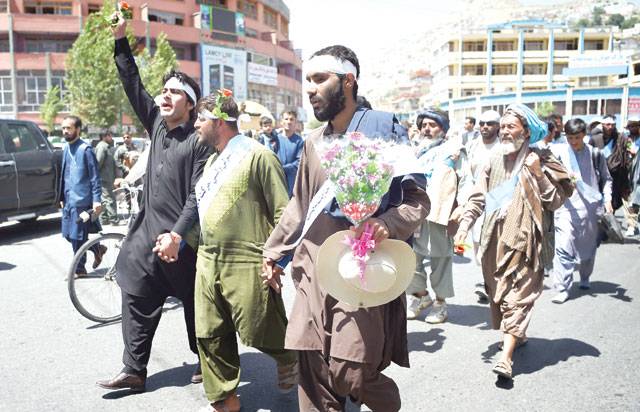 Peace marchers arrive in Kabul as fight resumes 