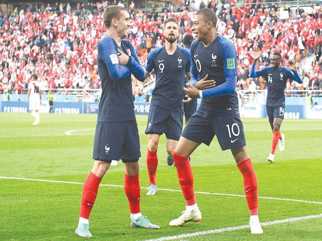 Mbappe makes history as France battle into last 16