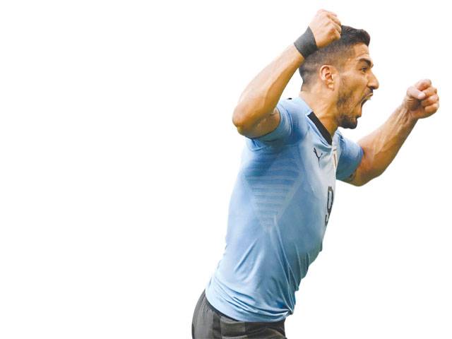 Suarez-inspired Uruguay top Group A