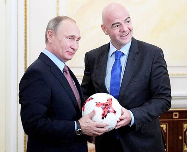 FIFA tells Putin world is 'in love' with Russia
